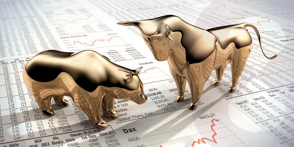 Render image of two golden figures (a bear and a bull) on a sheet of paper with indicies prices and charts
